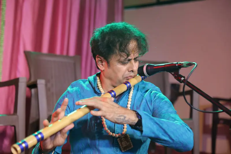 Prakash Hegde holding a bansuri